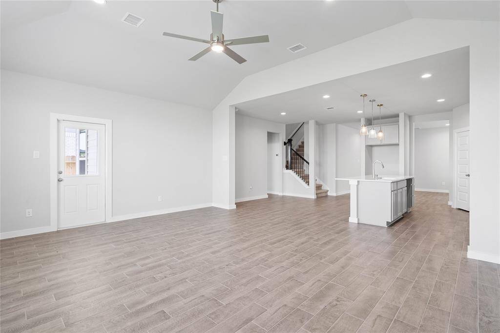 Additional view of the open space living area.