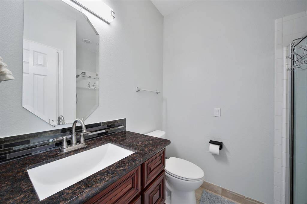 Bathroom with shower for second downstairs bedroom and guests!