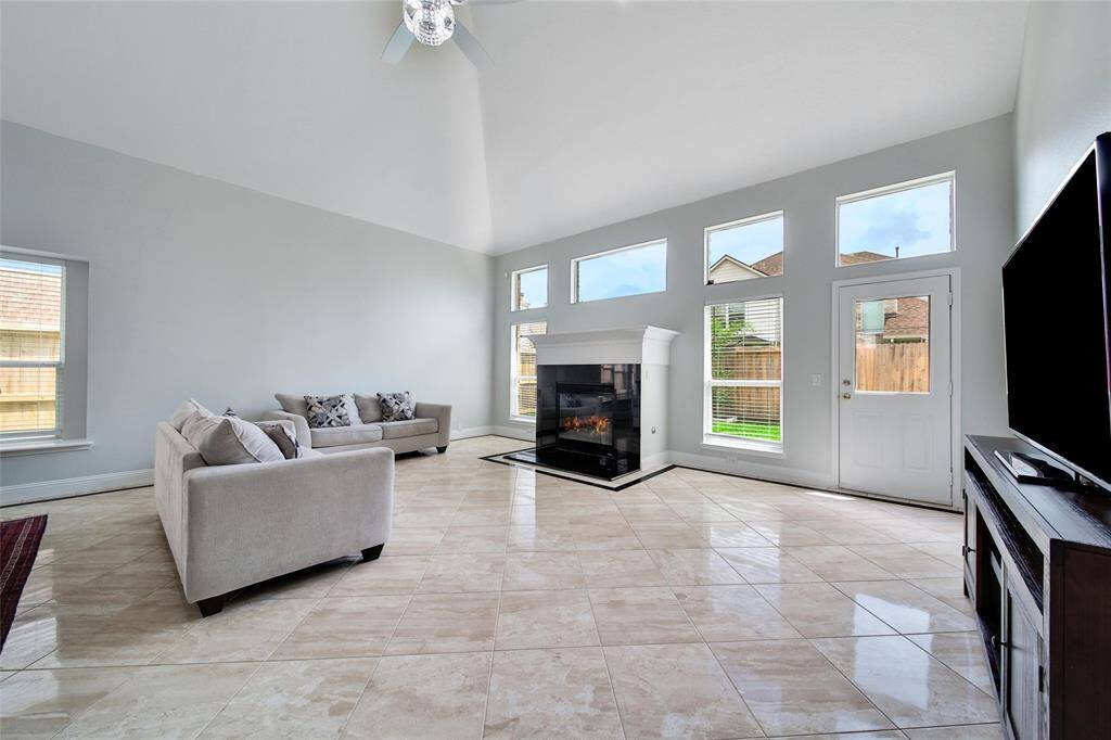 High ceilings and large fireplace!