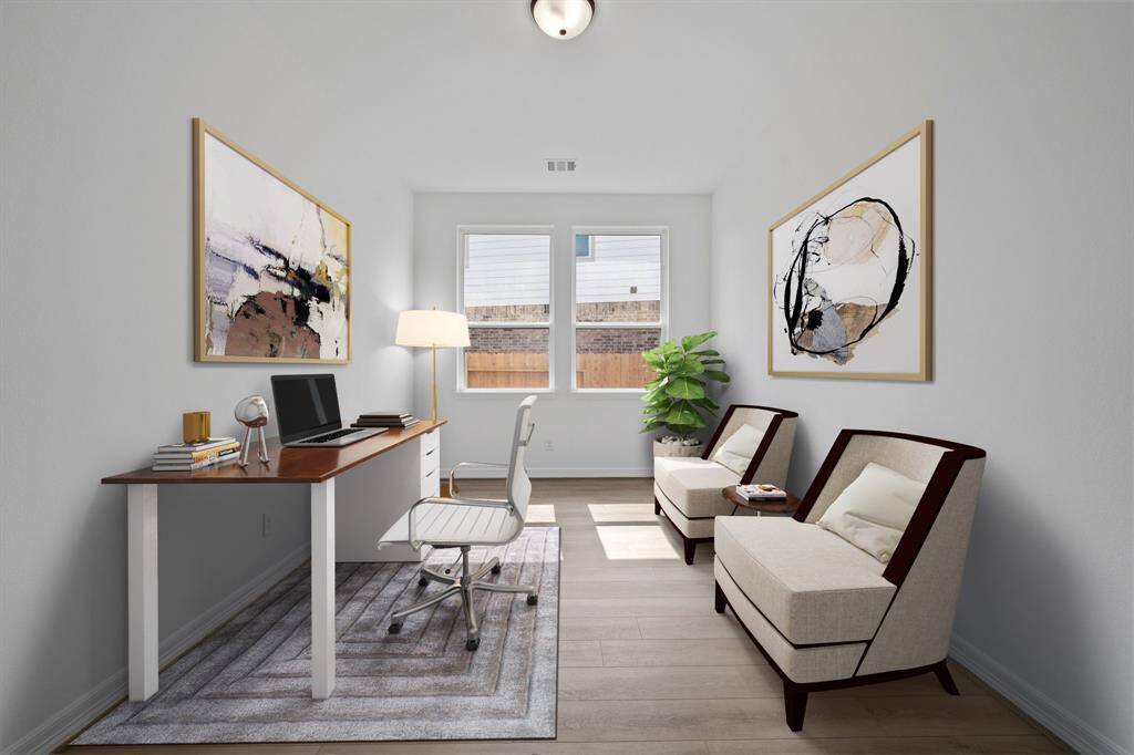 The home office features French doors, beautiful floors, large windows that give a fresh feel, this space promotes focus and creativity.