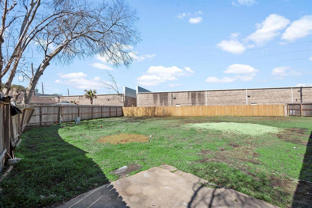 Fenced expansive backyard.