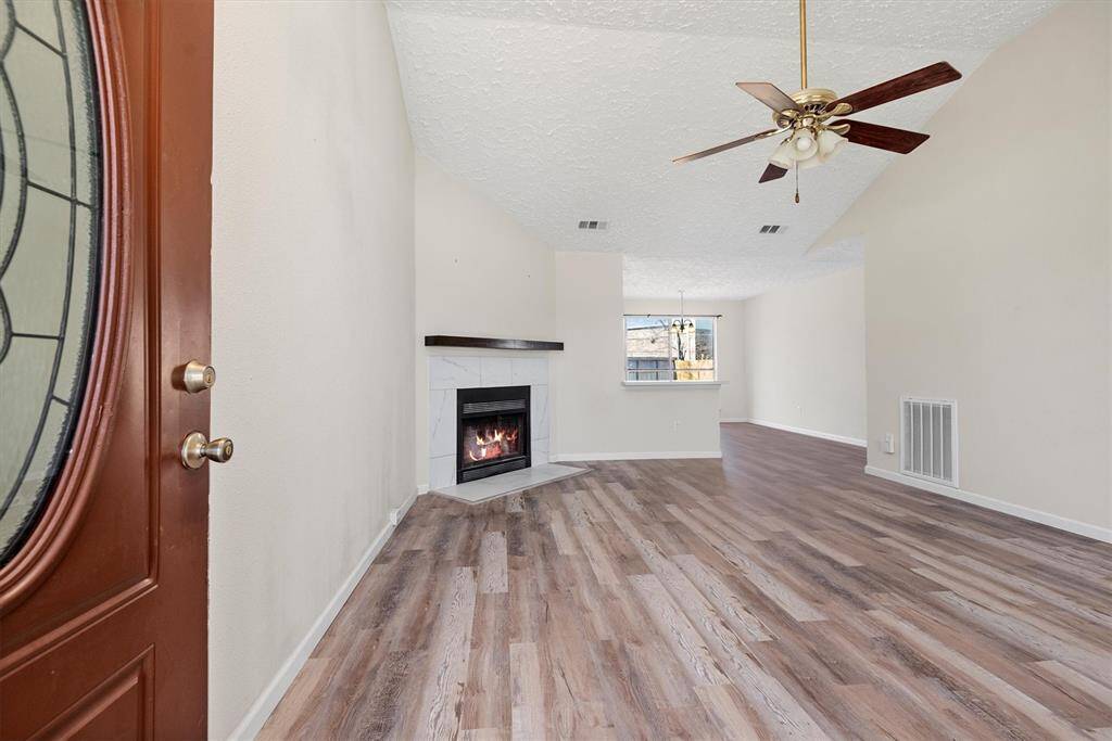 Living area. Open concept between living area and kitchen area.