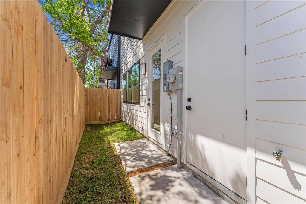 Exterior Rear: Door to the right is the climate controlled storage room.