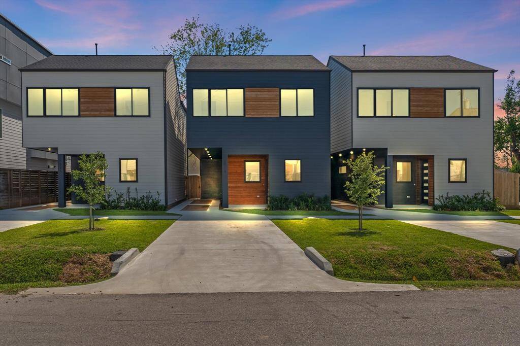 Twilight Exteriror: View of all 3 homes of Villas on Tulane. Home is located on the left.
