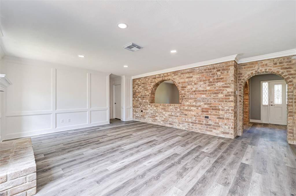Another view of the bright andspacious living room.