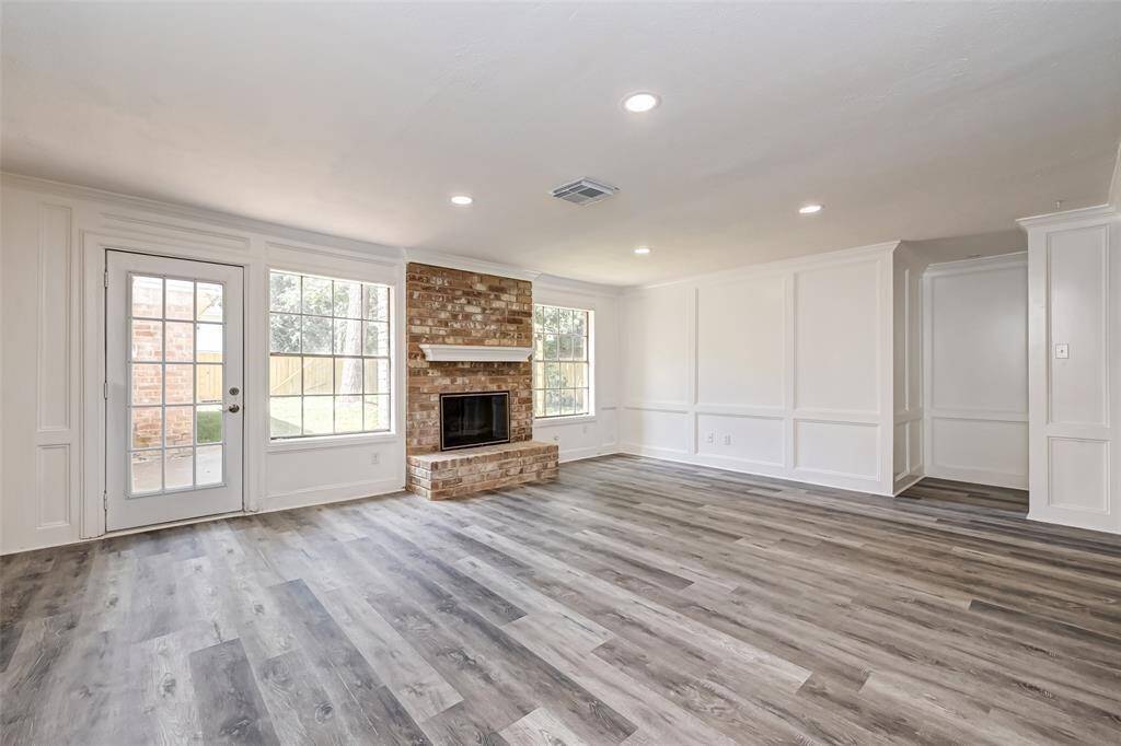 The , spacious living room also has access to the backyard.