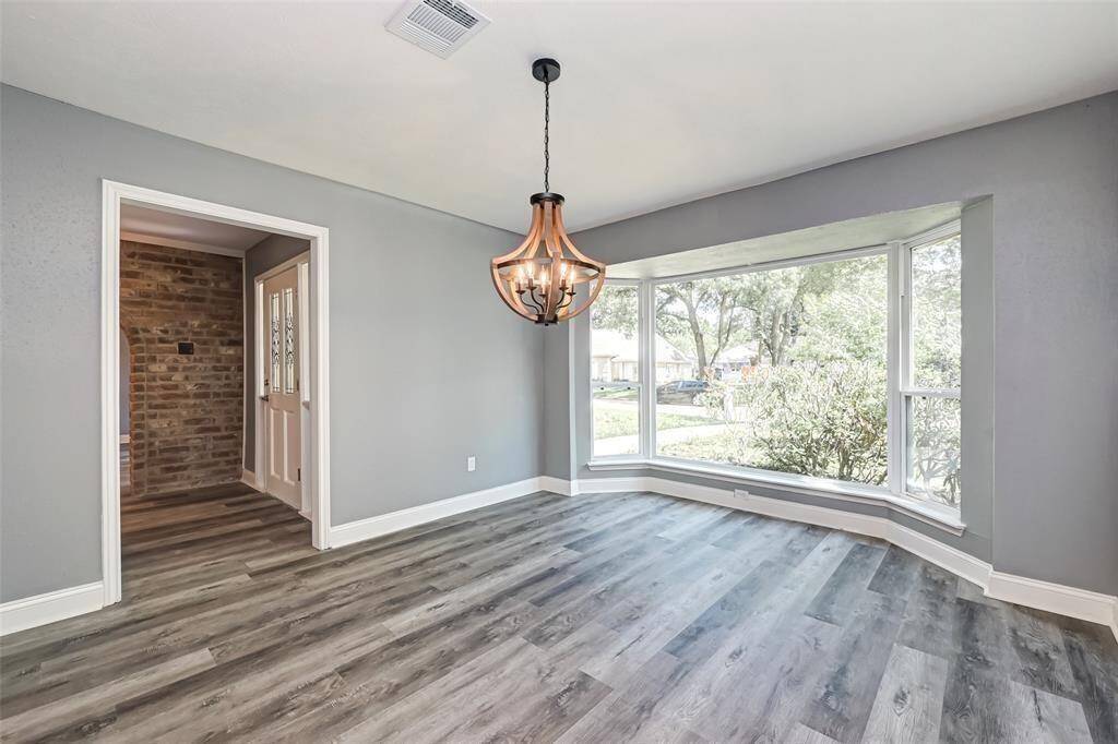 Upon entering is the dining room.
