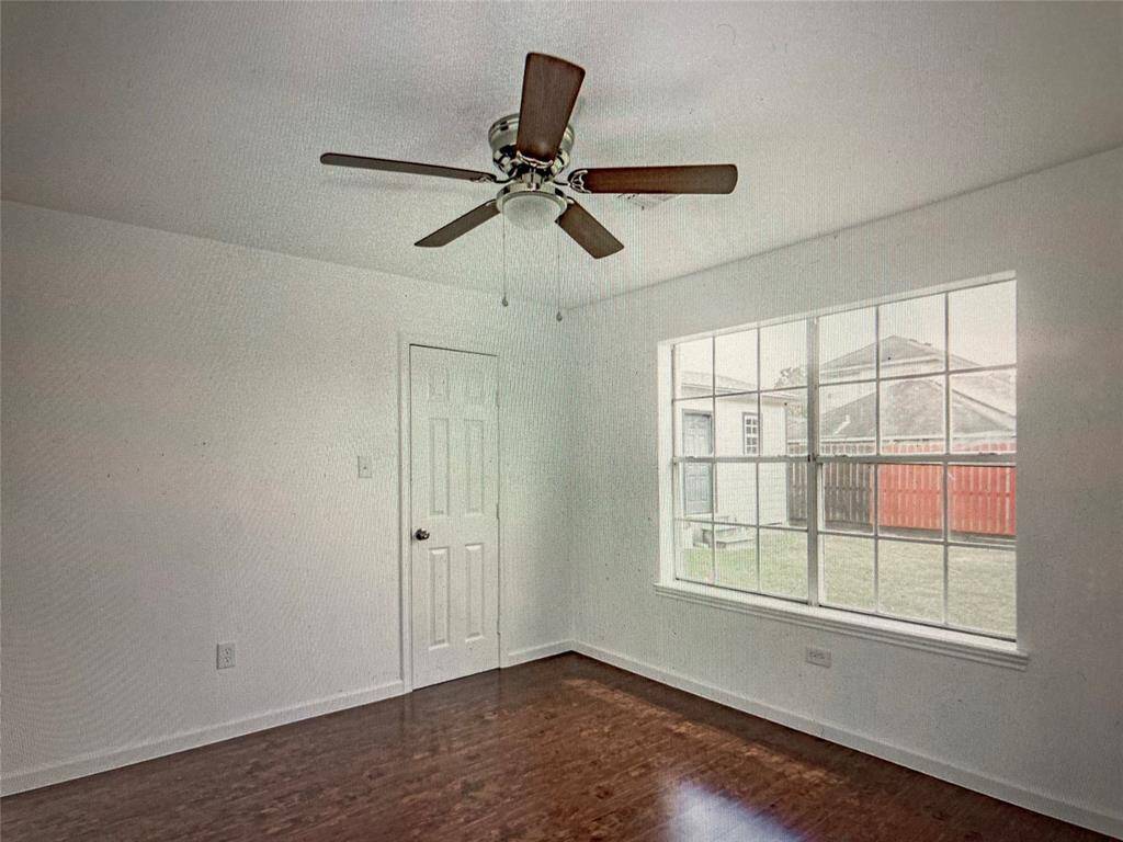 ONE OF THE SECONDARY BEDROOMS