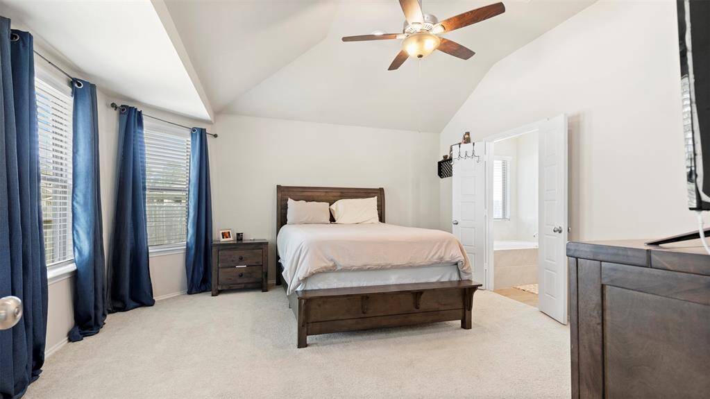 Massive primary room with bay windows!