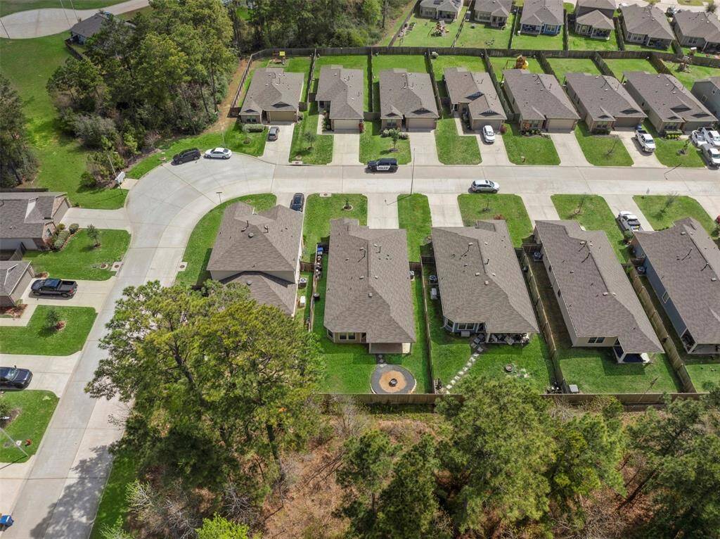 Enjoy the beautiful green space located directly behind the home.