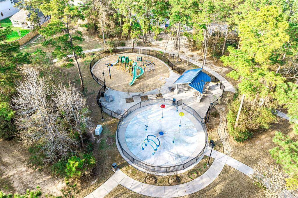 View of the playground, splash pad, and pavilion offered at Magnolia Ridge.