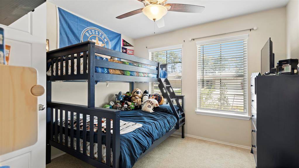 1st spacious secondary bedroom.