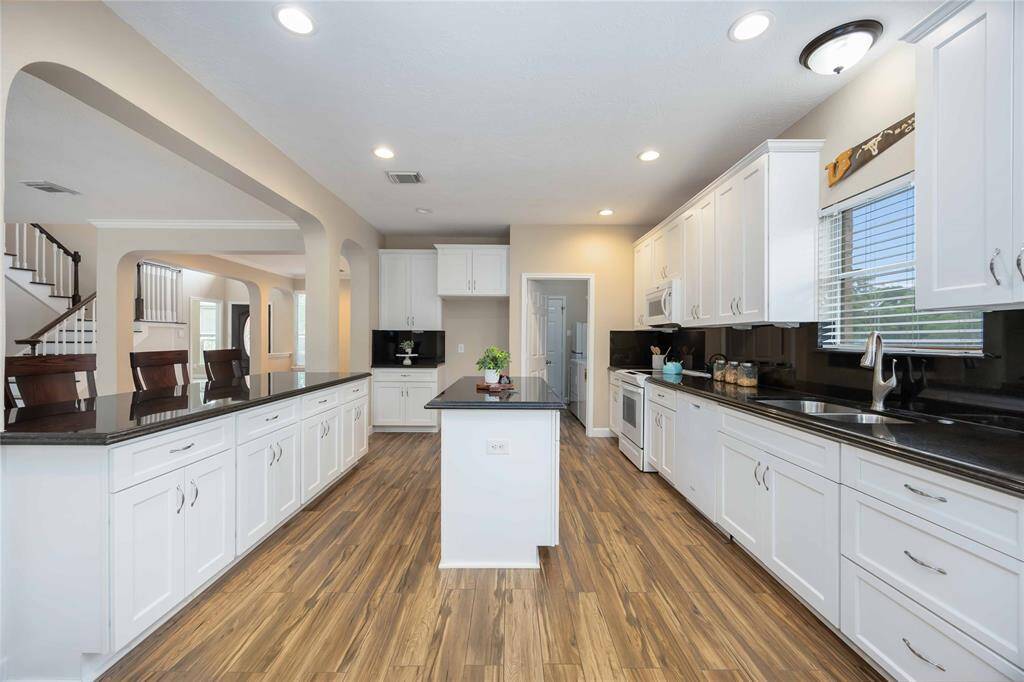 Look at all these cabinets.  This kitchen is made for you!  There is enough room for all your entertaining needs.