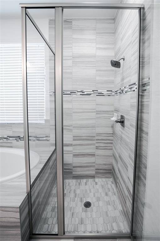 Primary bathroom with separated shower