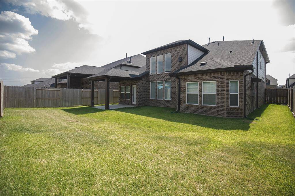 Nice sized back yard. House has the sprinkler system front and back.