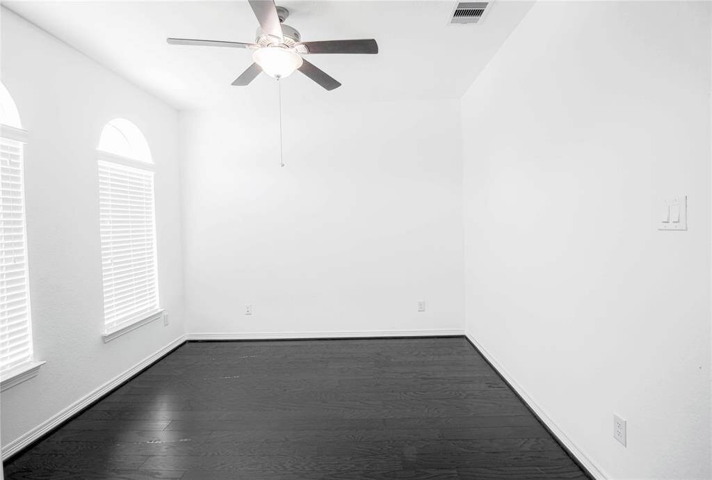 Study room with hard wood floor.