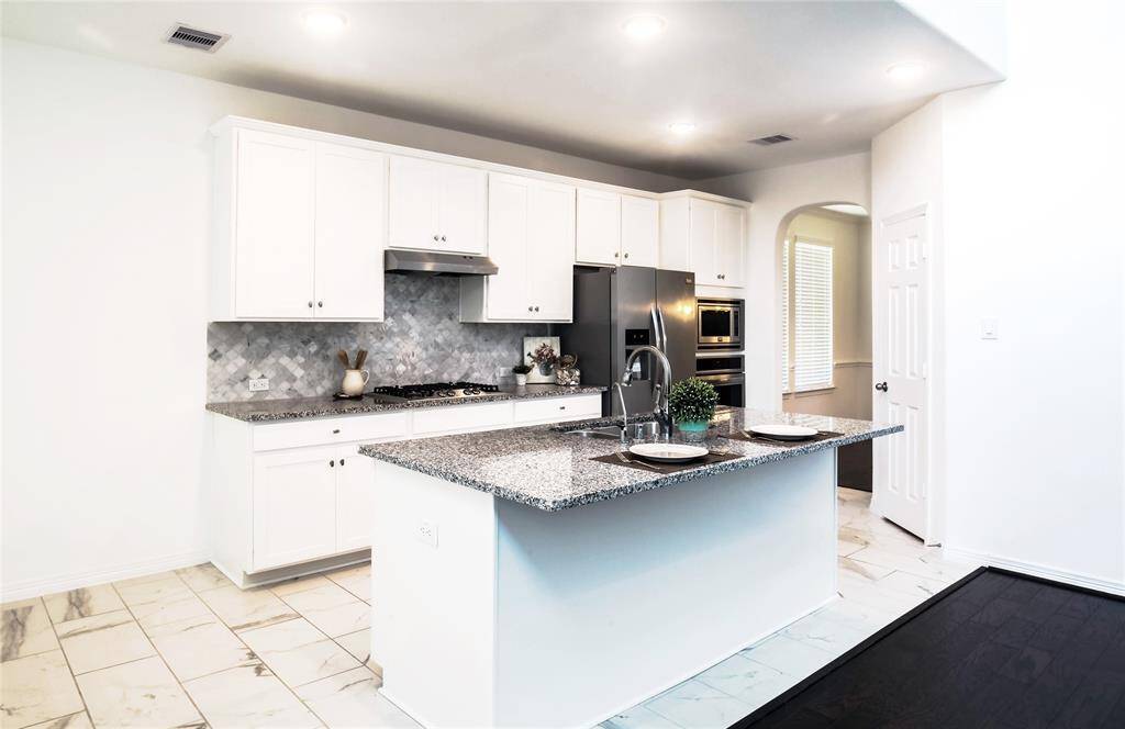 Kitchen with breakfast bar.