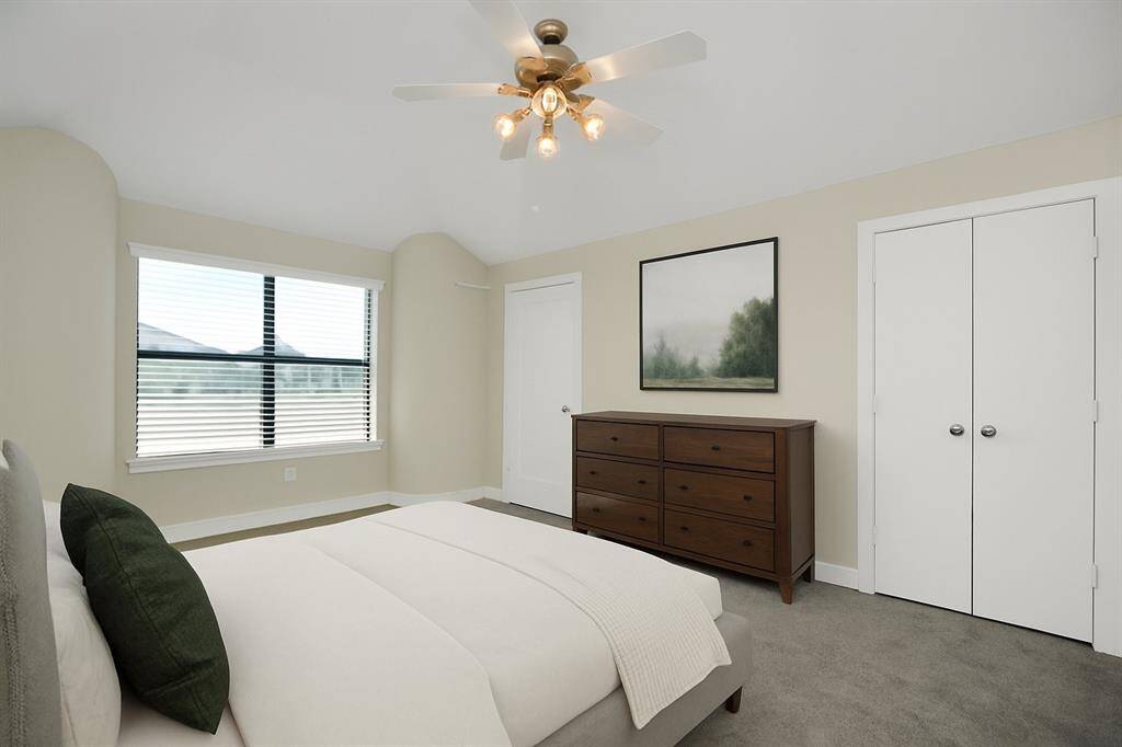 Virtually stated primary bedroom, large enough for a king size bed and dresser.  Large Walk-in Closet and ensuite bathroom.  The window allows lots of natural light as no home is behind the home, instead it is a park interior to the gated community!