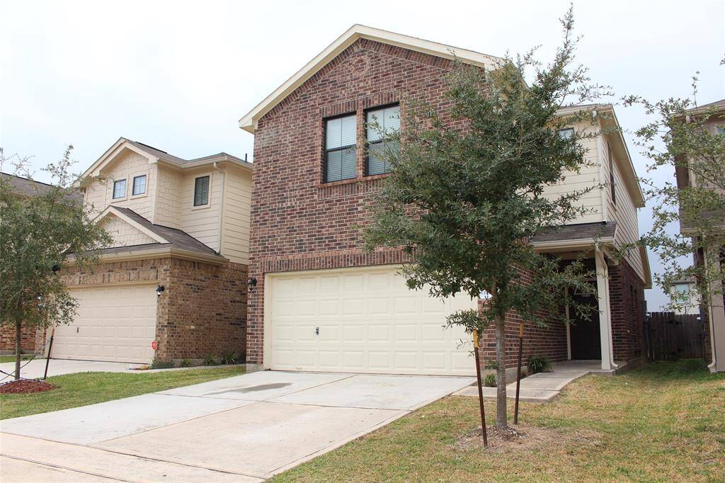 The home offers 3 bedrooms, 2 full bathroom and half bath plus two-car garage with garage door opener.
