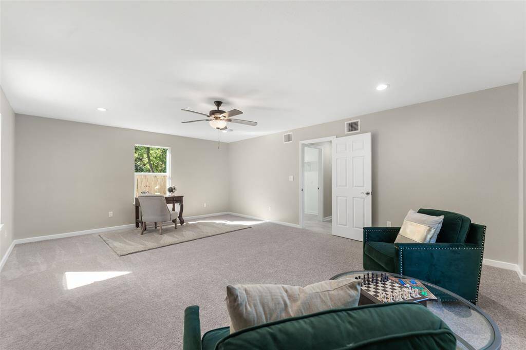 This first floor bedroom can also easily be converted into a guest room, game room or media room.