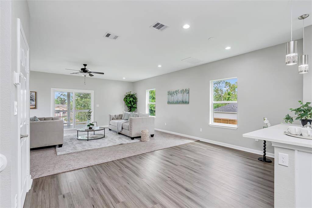 Light and bright neutral walls compliment beautiful flooring.
