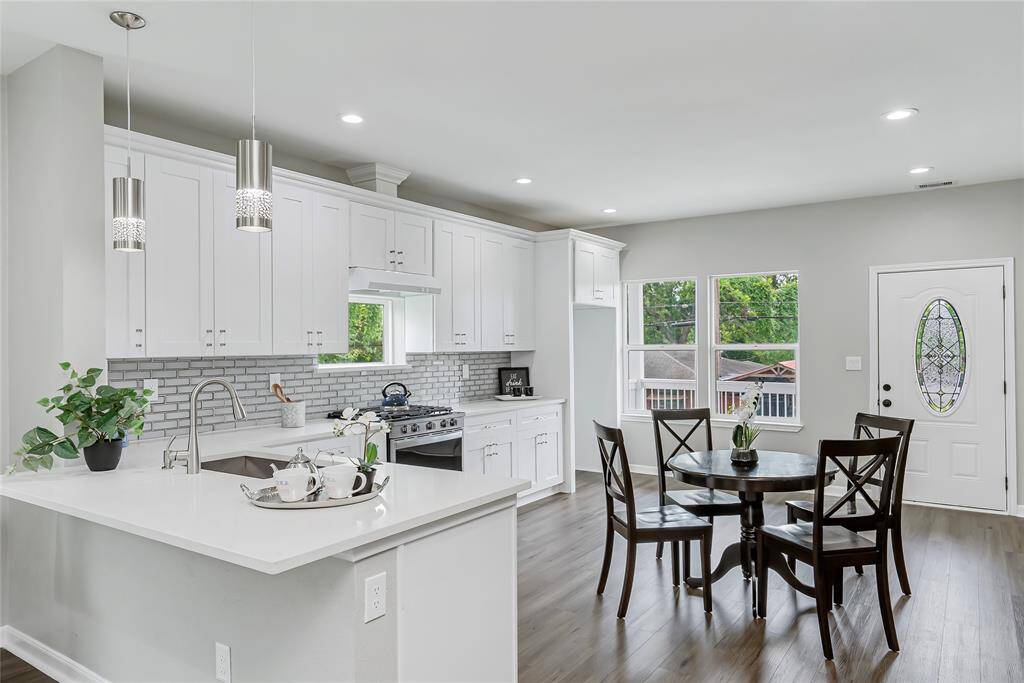 Prep all your gourmet meals on the extended Quartz counters. The peninsula offers counter seating for quick meals.