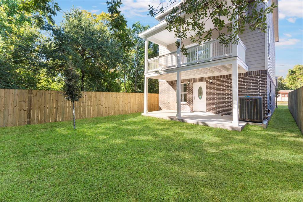 Yard space close to the city? No problem! This home prioritizes enjoying the great outdoors with multiple balconies, a covered back porch and plenty of green space.