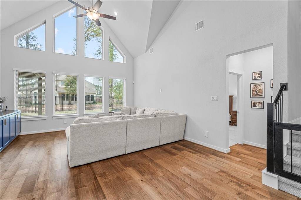 From the living room you can see the primary guest suite.