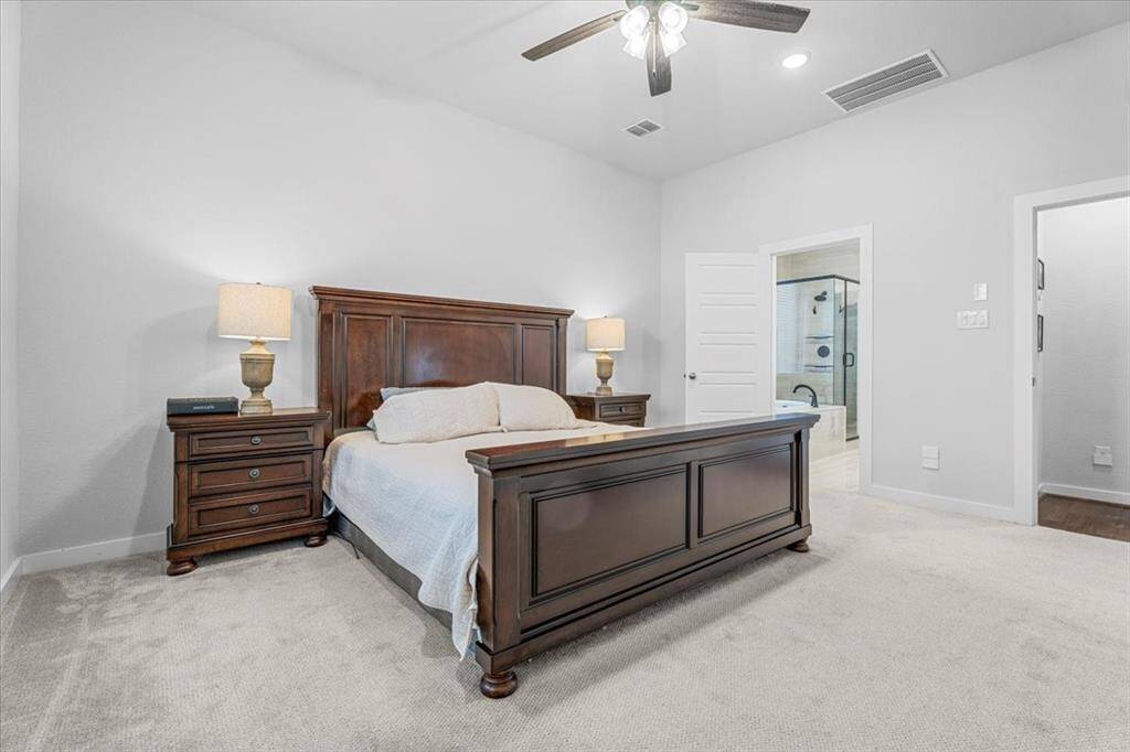 In the primary guest suite, you will find a neutral color pallet, vaulted ceilings, LED lights and a private oasis en-suite bathroom with a large walk-in closet.