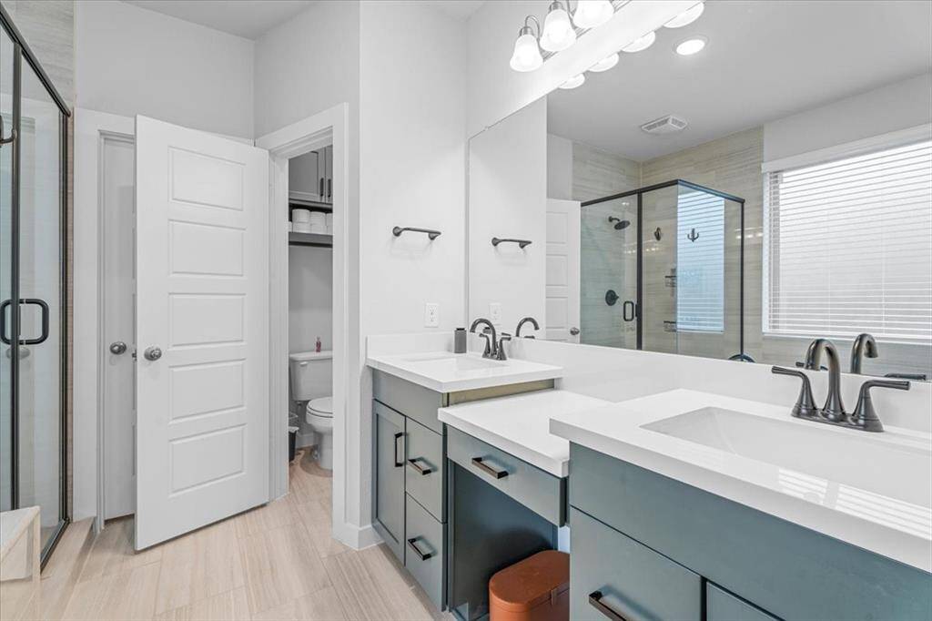 You'll notice to the right you have a private water closet, with lots of more storage.