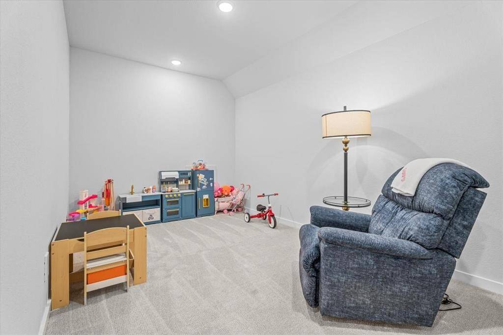 This room can serve as a playroom, flex room, study area, or movie room - so many possibilities for this space!