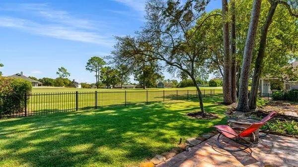 Check out this VIEW!  Sit on your stone patio in the shade and overlook the golf course with a cool drink in hand!