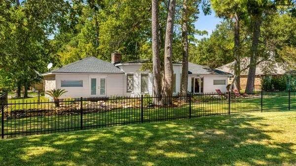 A wrought iron fence offers a boundary with views!