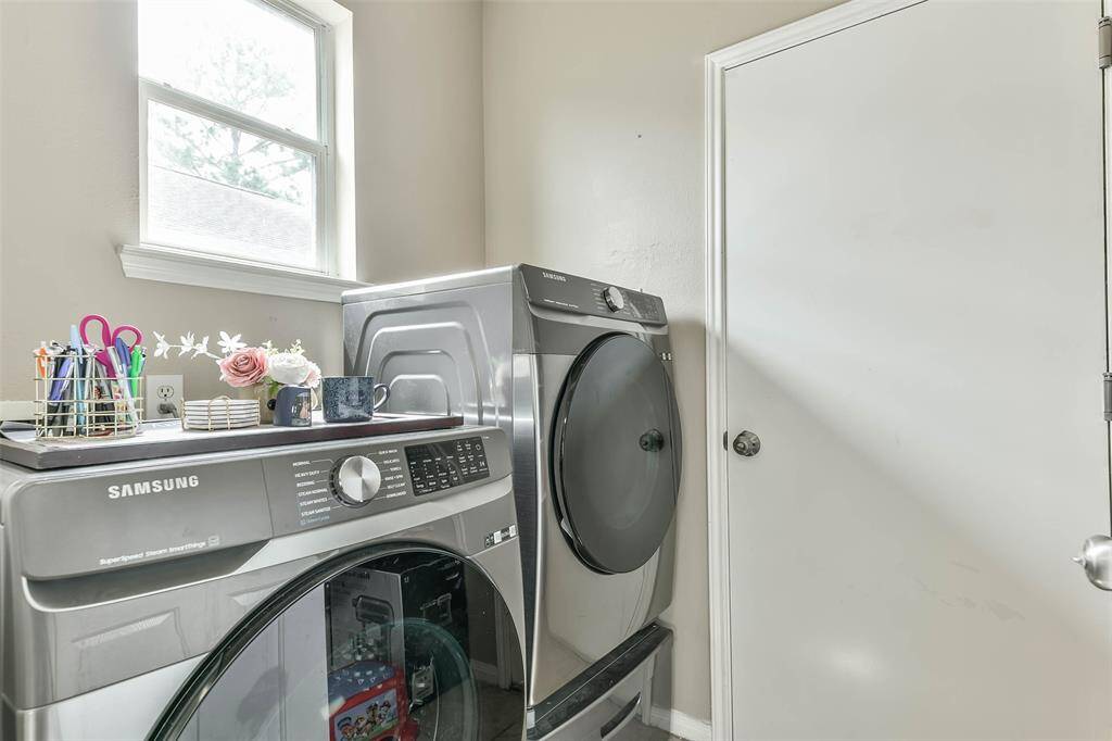 Laundry room conveniently connects kitchen to garage