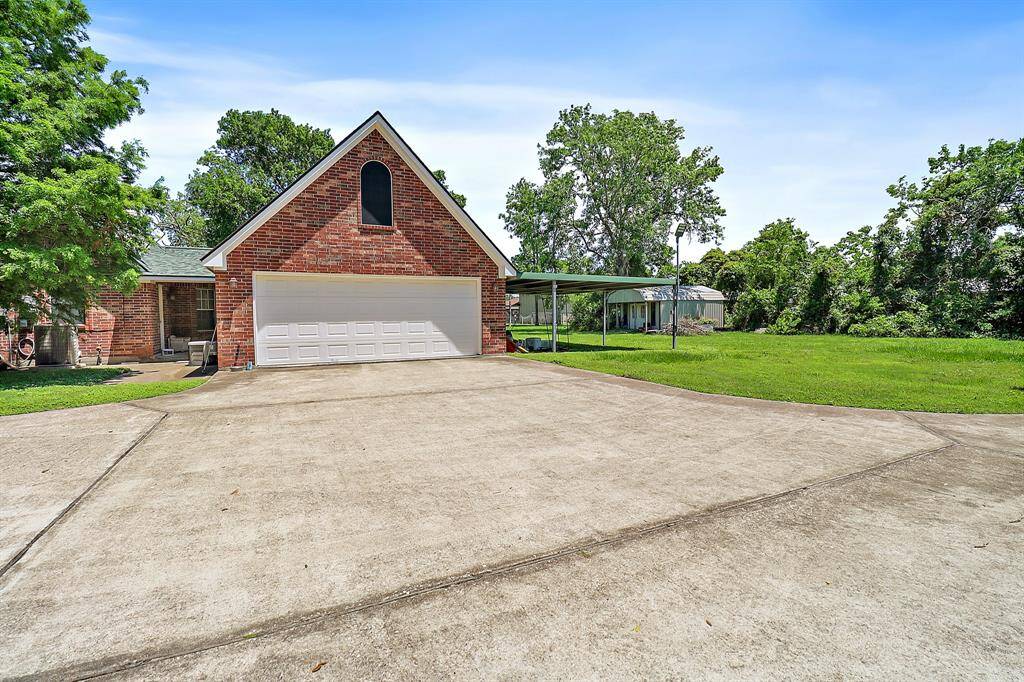 Detached garage with extra covered parking