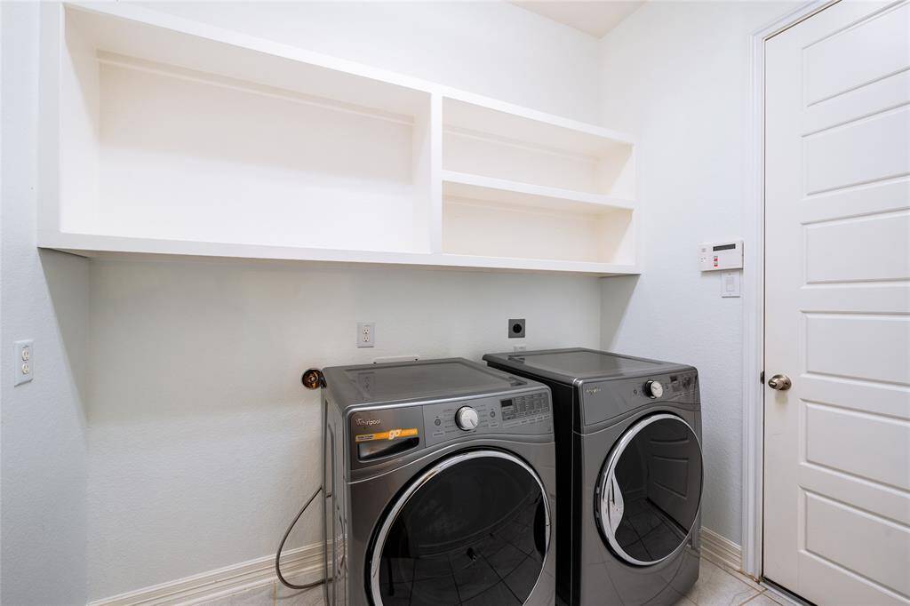 Utility room with built in shelf.