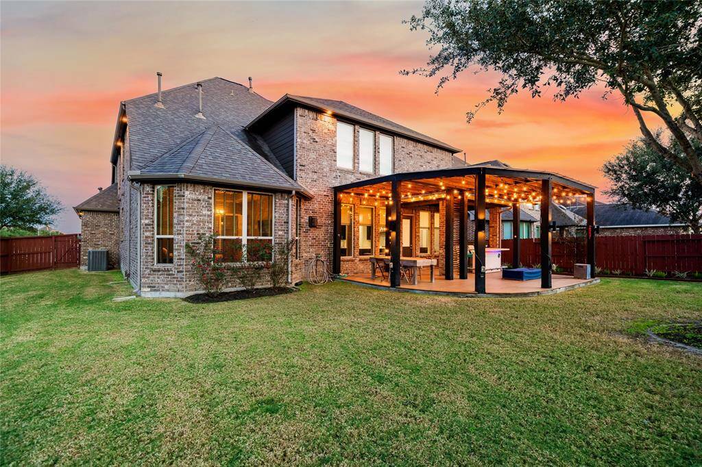Expansive backyard also offers endless possibilities, including space for a private pool, making it ideal for customization to suit your outdoor lifestyle. The manicured lawn is perfect for recreational activities or creating a serene garden retreat. The property is enhanced by a thoughtfully designed patio that seamlessly integrates with the home’s architecture. With its peaceful setting and ample room for upgrades, this yard balances practicality with potential for luxurious enhancements.
