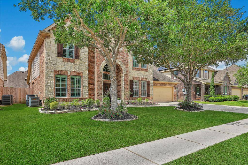 Taking another look of the exterior view of this beautiful home.  Sidewalks present a safe path for walking and bike riding.