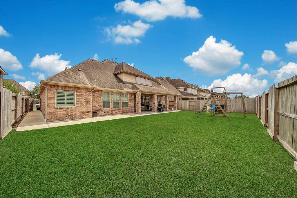 Look at the walk way from the driveway all the way to the extended patio!  *grass has been enhanced