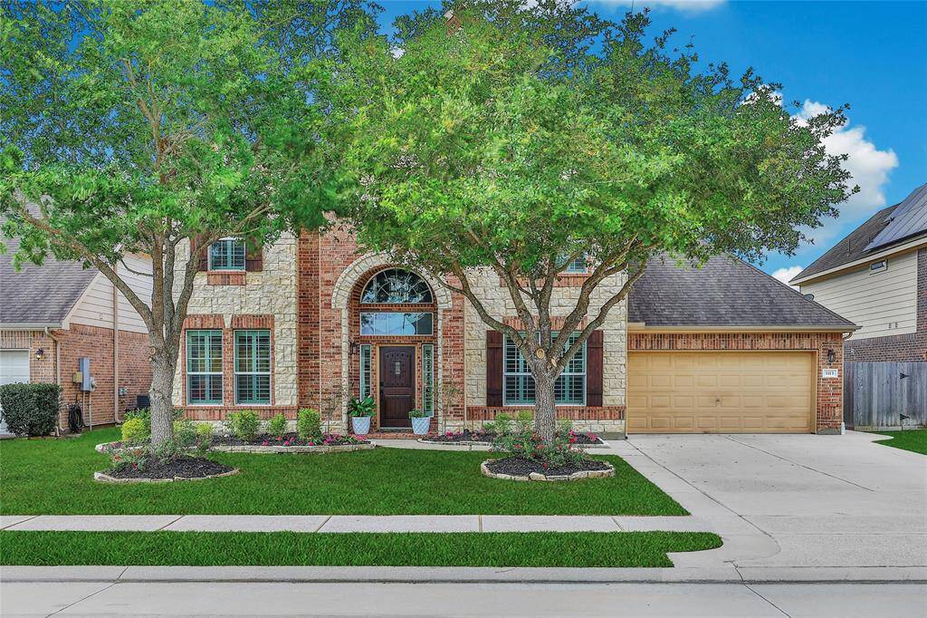 Extended driveway around to the back gate and extra walkway creates pulling up and getting out so much easier!