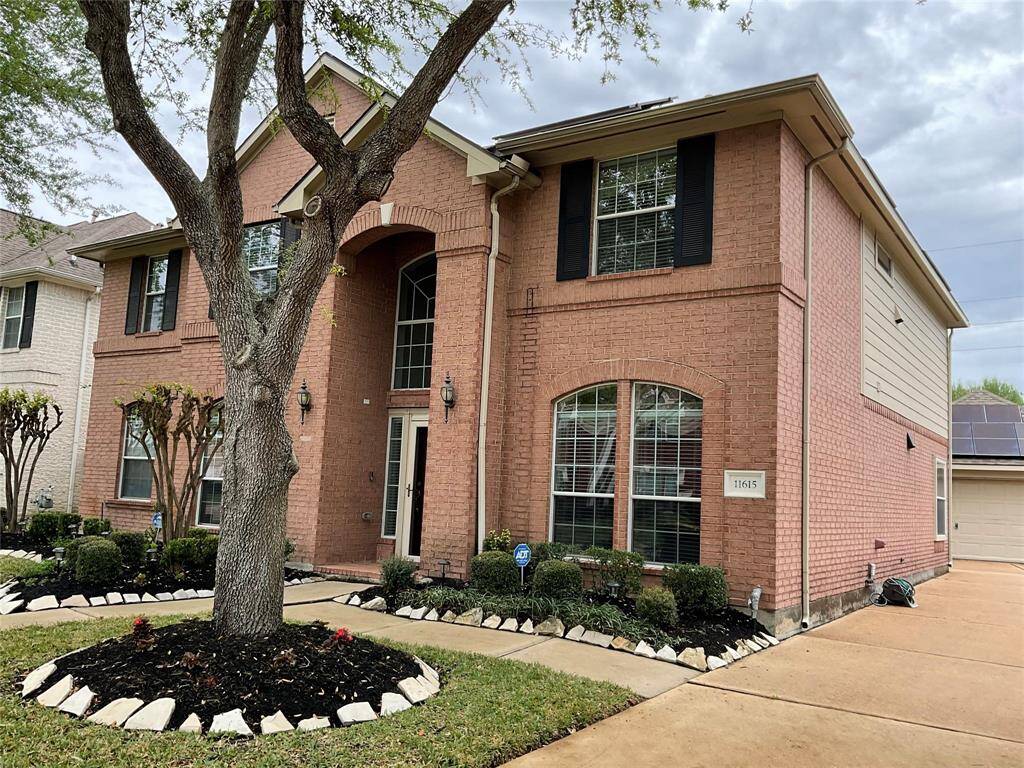 Gorgeous Newmark Home with private driveway into the detached garage