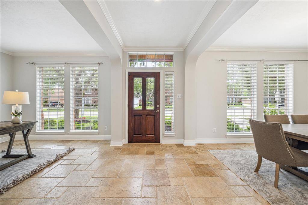 From the foyer, the hallway leads to the family room.