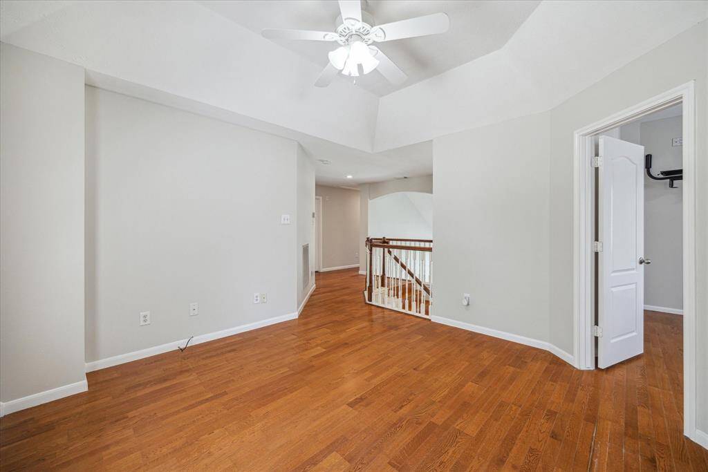 At the top of the staircase is a spacious game room, perfect for your favorite game table or could be used as a play room or another living area.