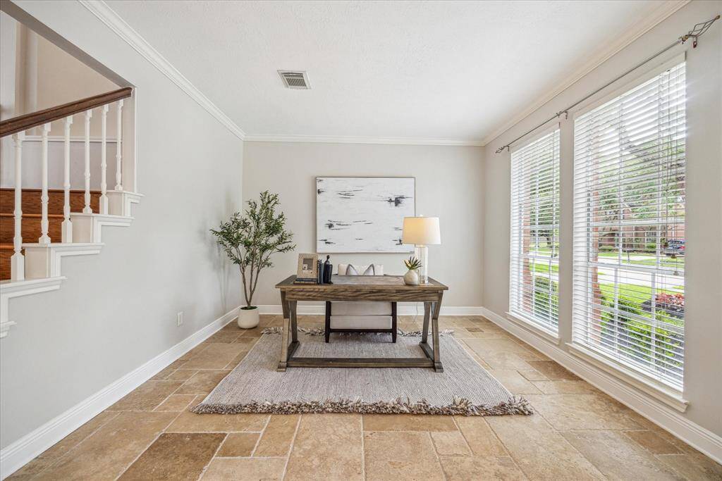 To the right of the foyer is the study, which could also be used as a 2nd living area.