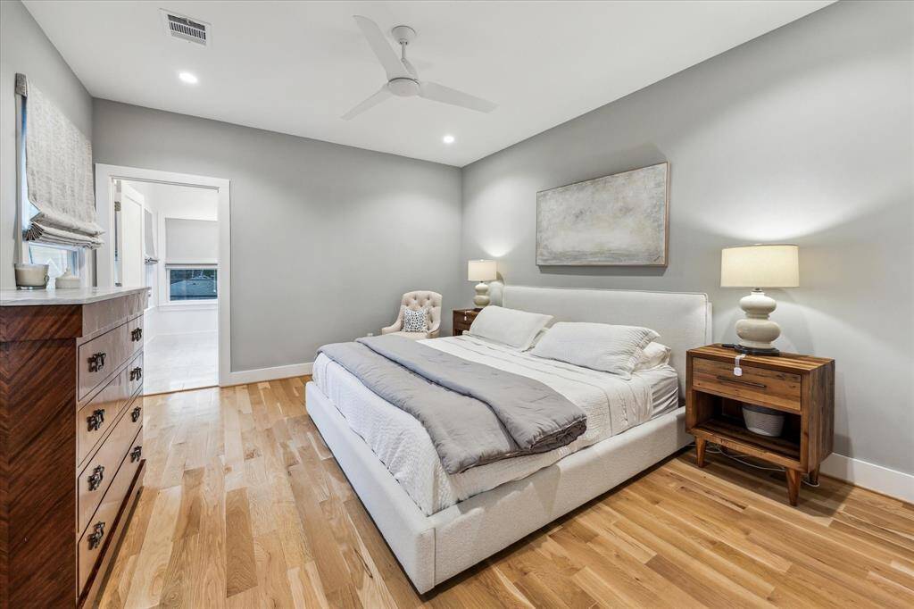 Spacious primary suite with recessed lighting, ceiling fan and an incredible ensuite bath.