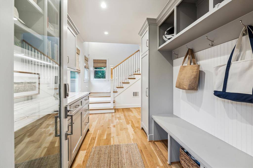 The mudroom is conveniently located just inside the back door.