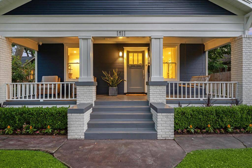 Inviting covered front porch is the perfect space to sit and enjoy all that Heights living has to offer!