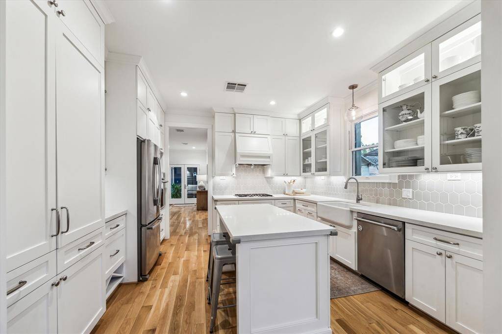 The kitchen was updated is located between the dining room and the family room making it ideal for entertaining.