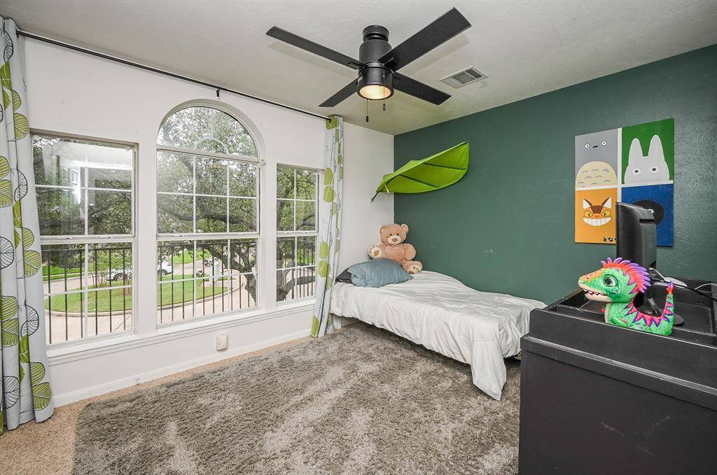 wood flooring through the upstairs hallway and down the stairs