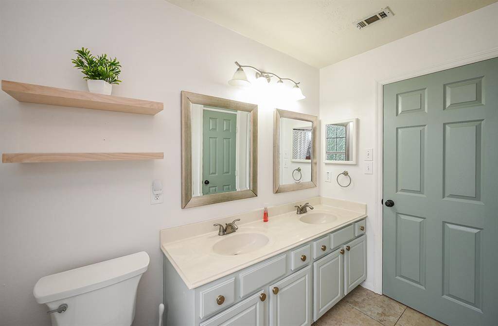 Double sinks with lots of cabinets